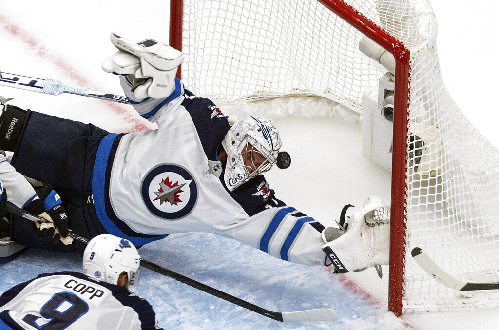 APTOPIX Jets Flames Hockey